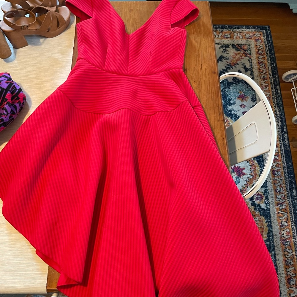 Semi formal red dress with asymmetric hem